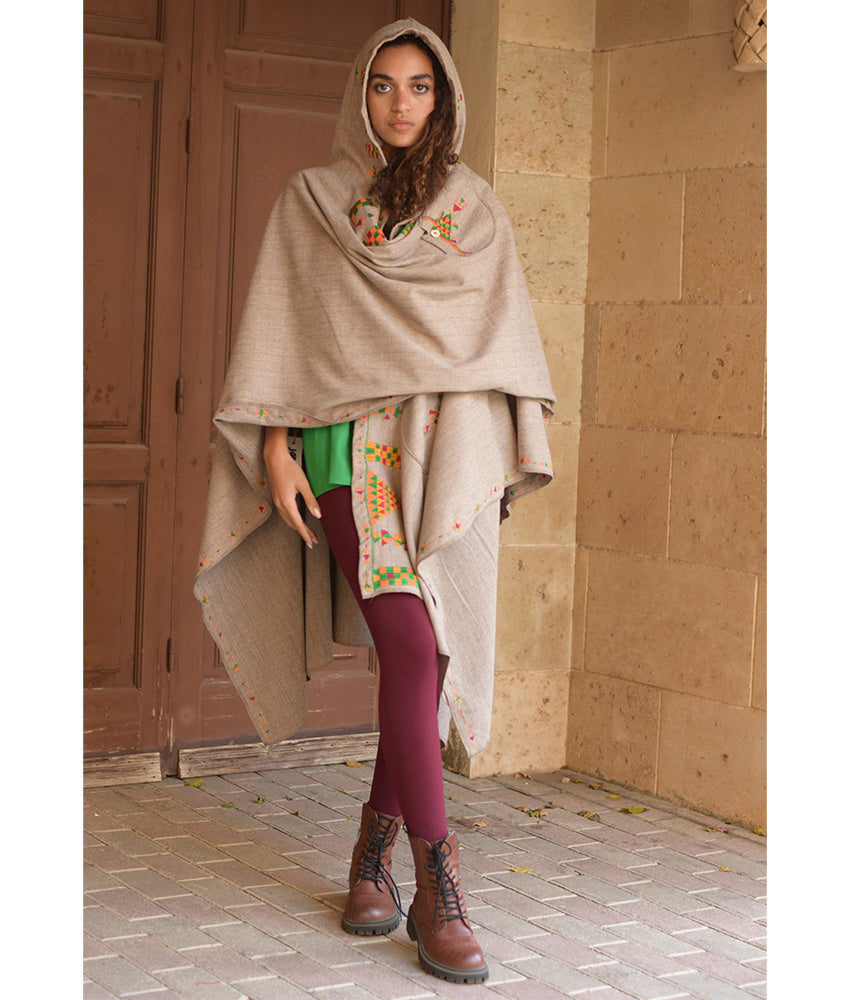 Beige Siwa Embroidered Wool Midi Cape handmade in Egypt & available at Jozee Boutique.