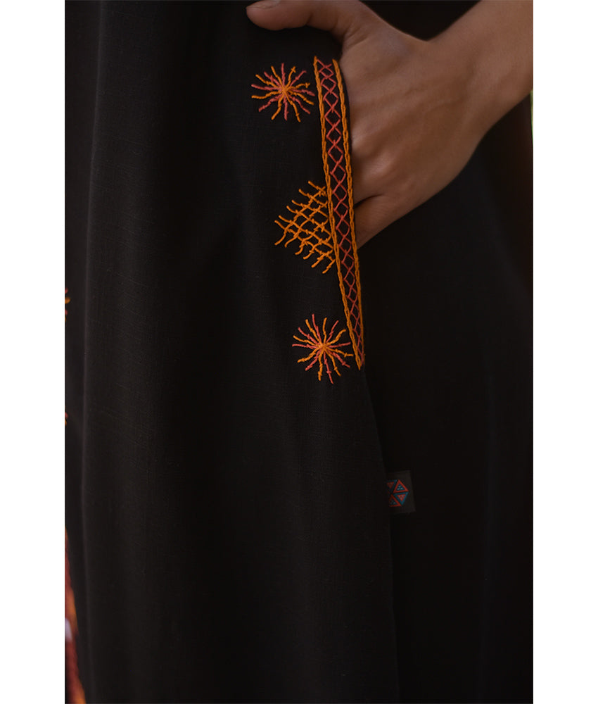 Black Siwa Heavily Embroidered Linen Dress with Hoodie handmade in Egypt & available at Jozee Boutique.