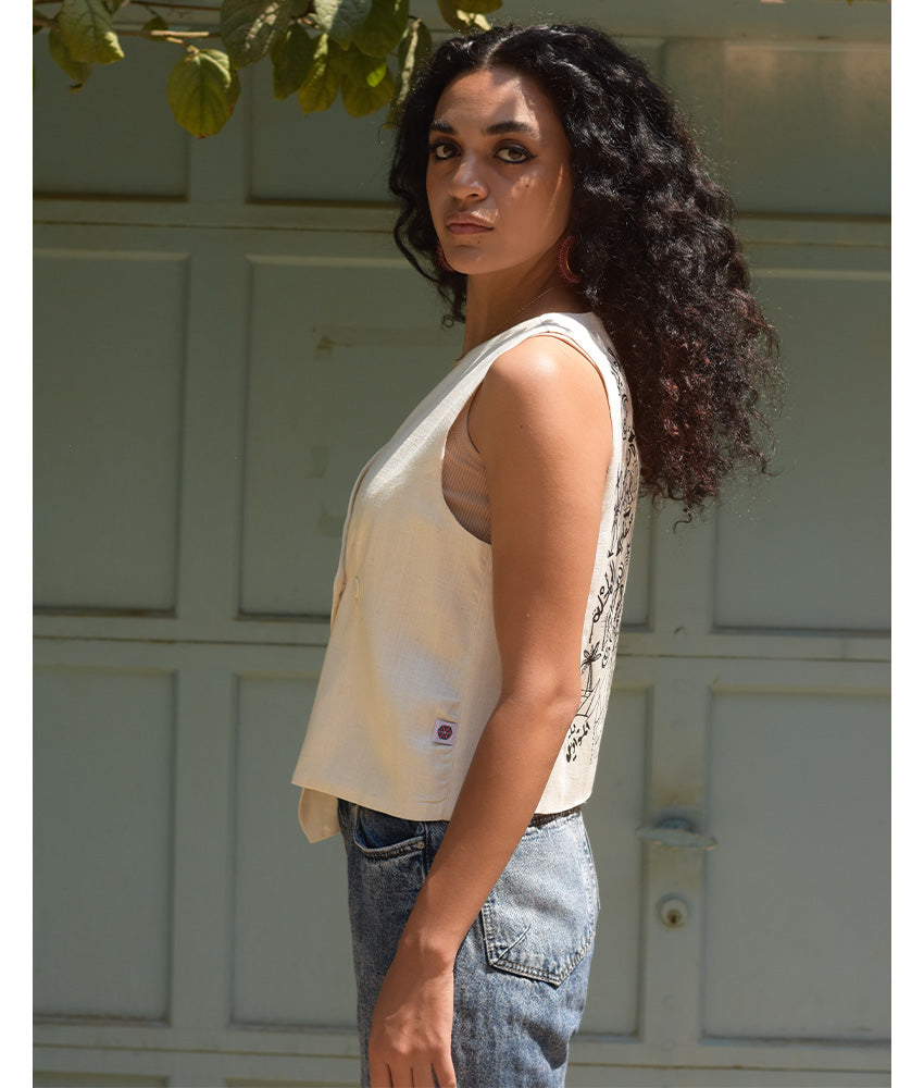 Off-White El Mahrousa Linen Wrap Vest handmade in Egypt & available at Jozee Boutique.