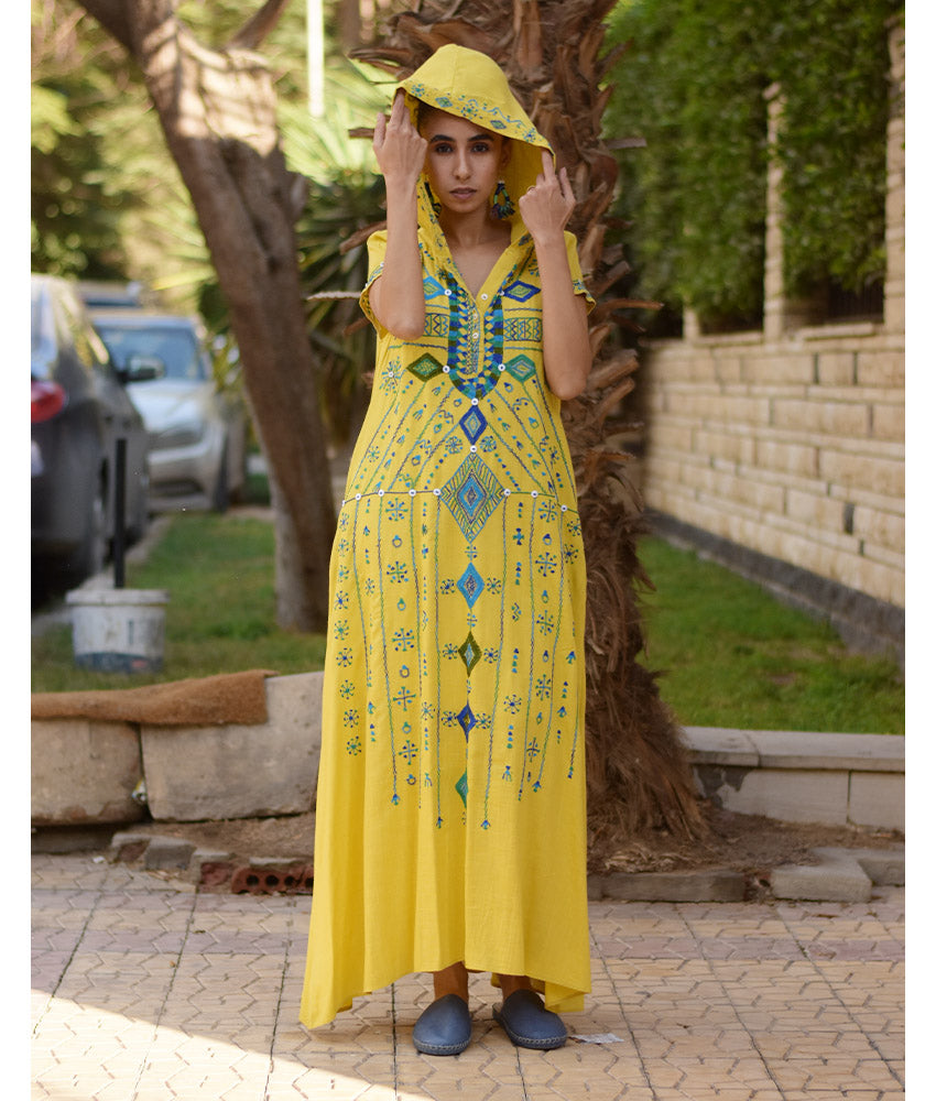 Mustard Siwa Heavily Embroidered Linen Dress with Hoodie handmade in Egypt & available at Jozee Boutique.