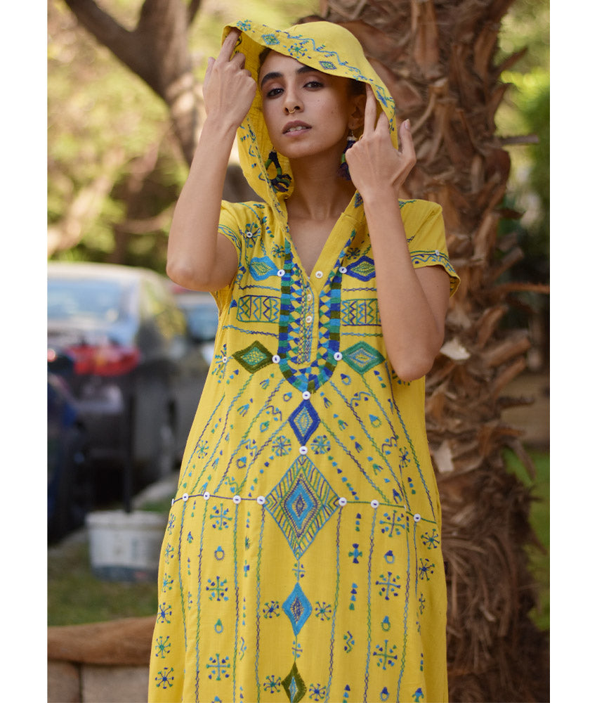 Mustard Siwa Heavily Embroidered Linen Dress with Hoodie handmade in Egypt & available at Jozee Boutique.