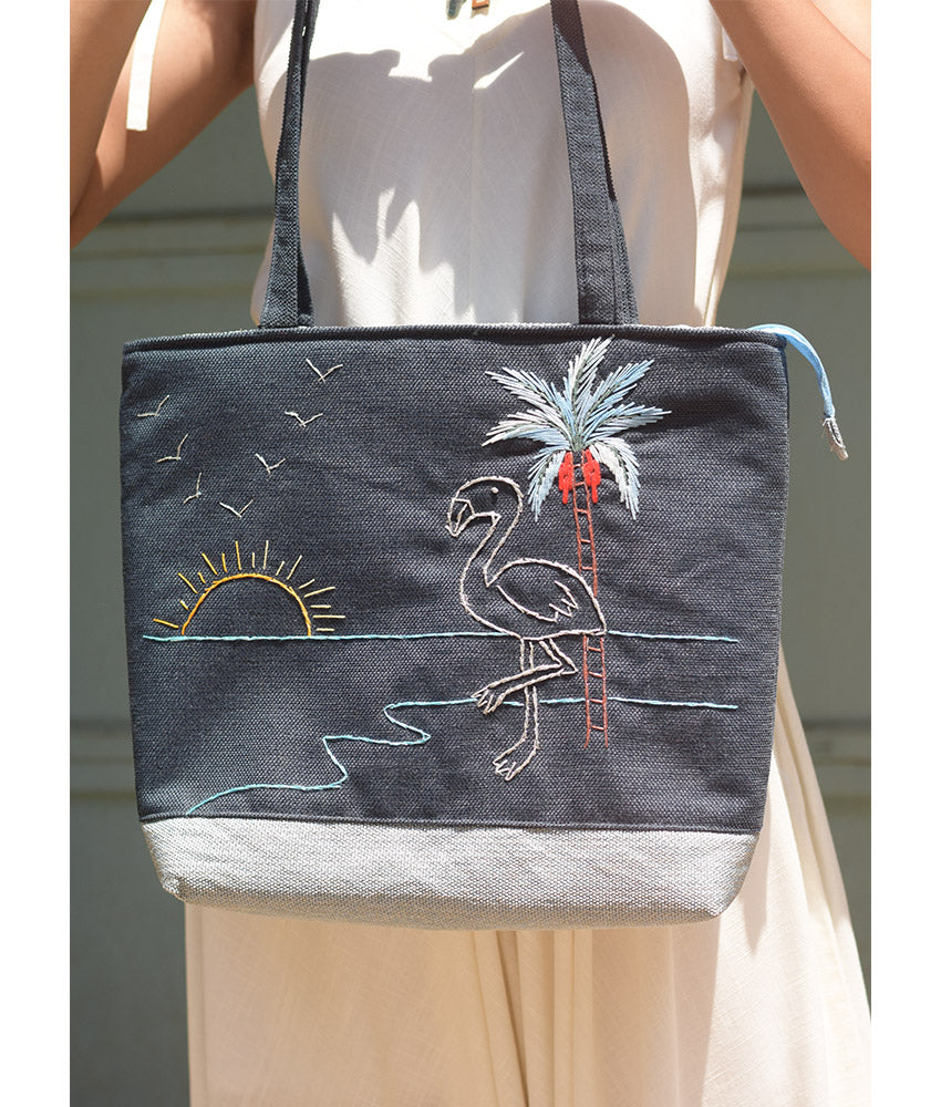 Grey Embroidered Palm Linen Tote Bag handmade in Egypt & available at Jozee Boutique.handmade in Egypt & available at Jozee Boutique.