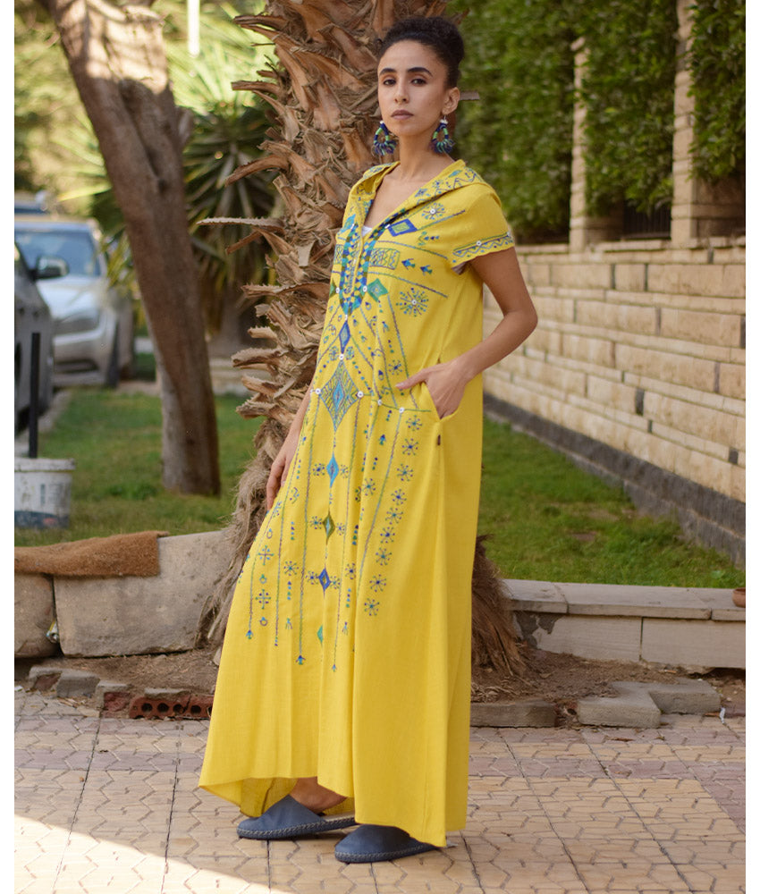 Mustard Siwa Heavily Embroidered Linen Dress with Hoodie handmade in Egypt & available at Jozee Boutique.