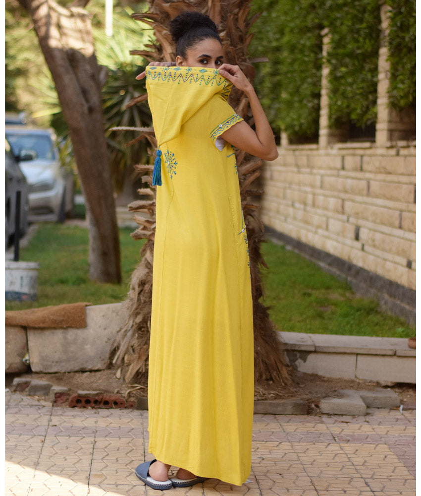 Mustard Siwa Heavily Embroidered Linen Dress with Hoodie handmade in Egypt & available at Jozee Boutique.