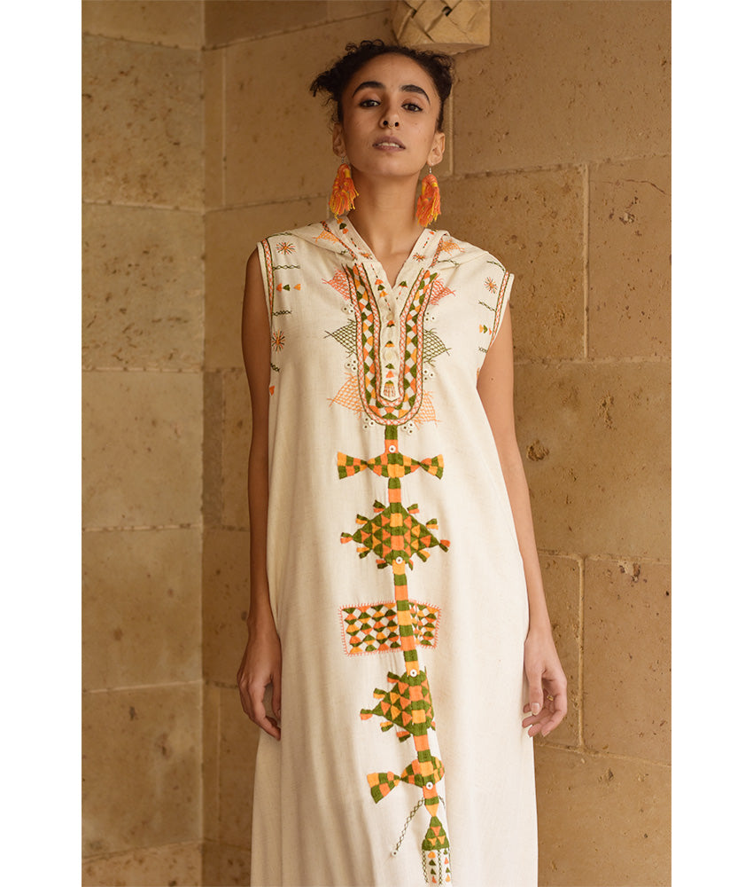 Off white Siwa Heavily Embroidered Linen Dress with Hoodie handmade in Egypt & available at Jozee Boutique.