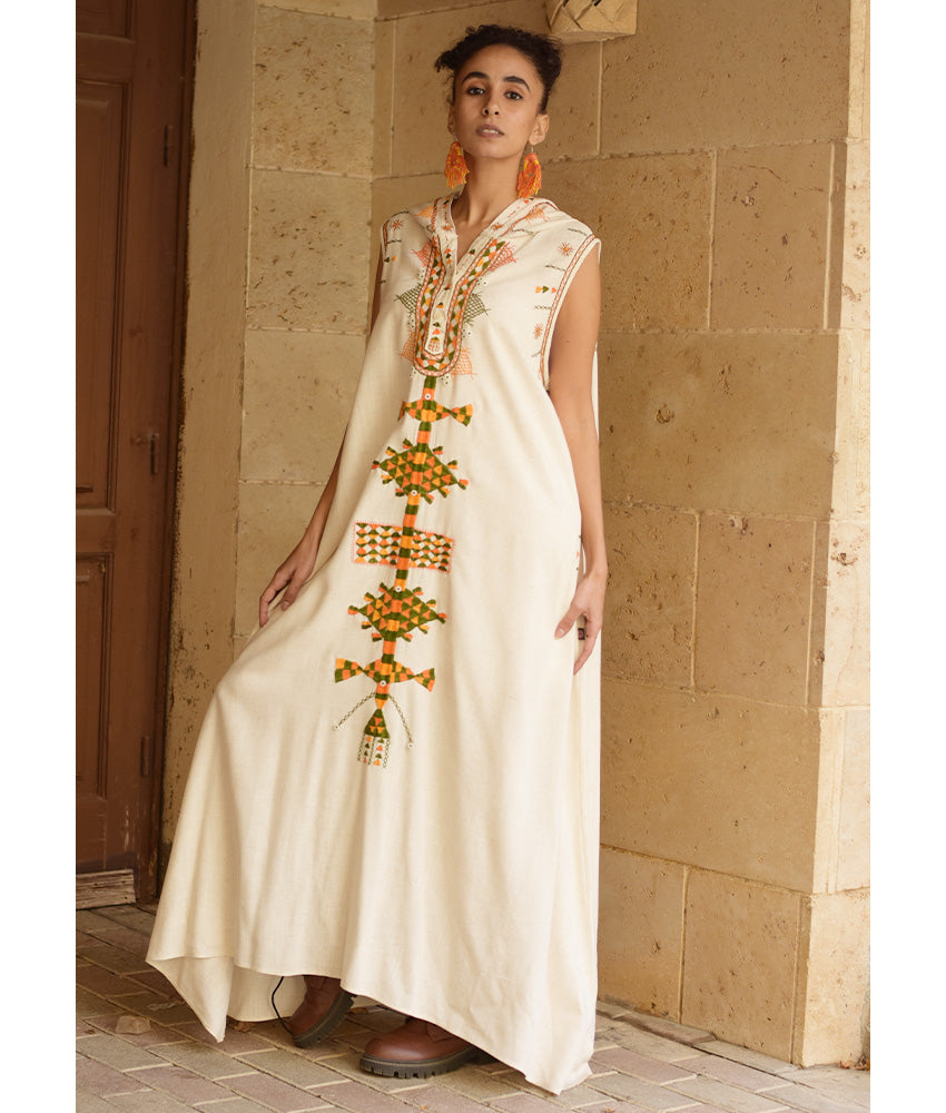 Off white Siwa Heavily Embroidered Linen Dress with Hoodie handmade in Egypt & available at Jozee Boutique.