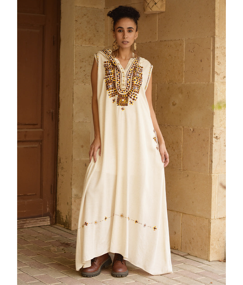 Off white Siwa Embroidered Linen Dress with Hoodie handmade in Egypt & available at Jozee Boutique.