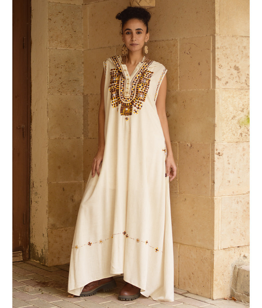 Off white Siwa Embroidered Linen Dress with Hoodie handmade in Egypt & available at Jozee Boutique.