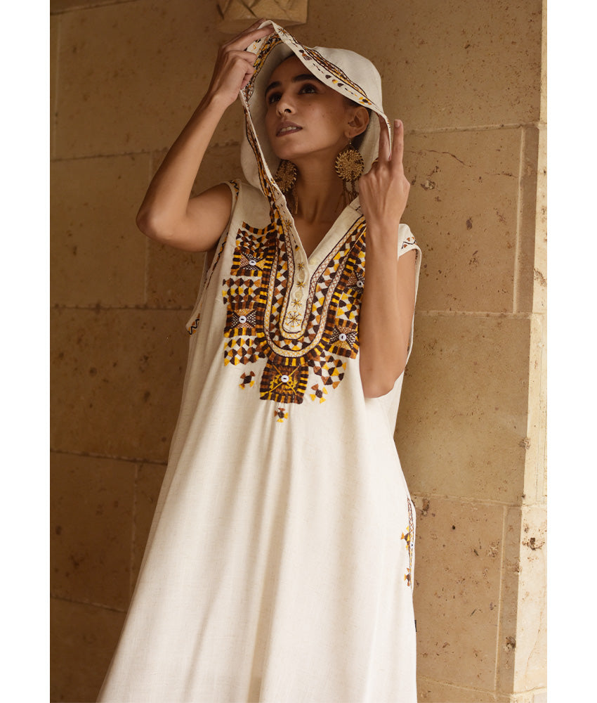 Off white Siwa Embroidered Linen Dress with Hoodie handmade in Egypt & available at Jozee Boutique.