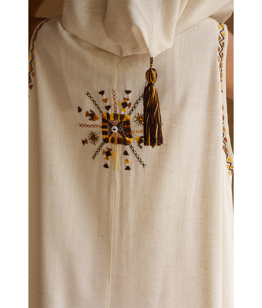 Off white Siwa Embroidered Linen Dress with Hoodie handmade in Egypt & available at Jozee Boutique.