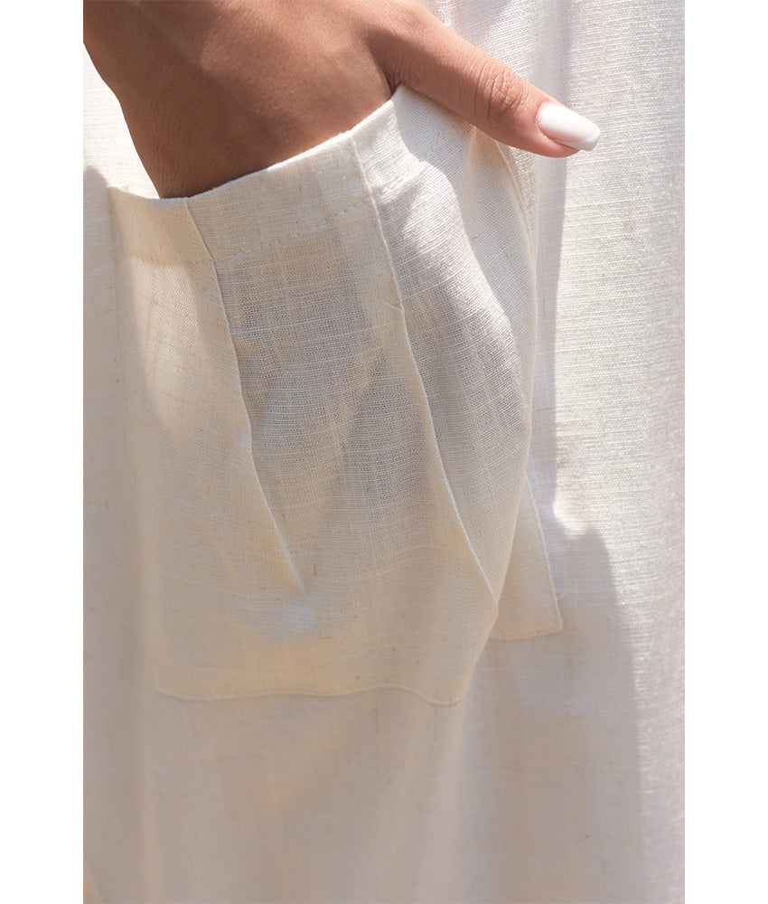 White Relaxed-Fit Linen Midi Dress with Pockets handmade in Egypt & available at Jozee Boutique.
