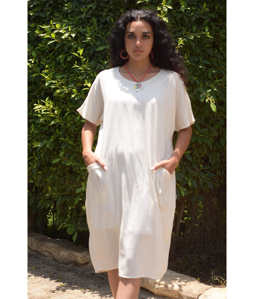 White Relaxed-Fit Linen Midi Dress with Pockets handmade in Egypt & available at Jozee Boutique.