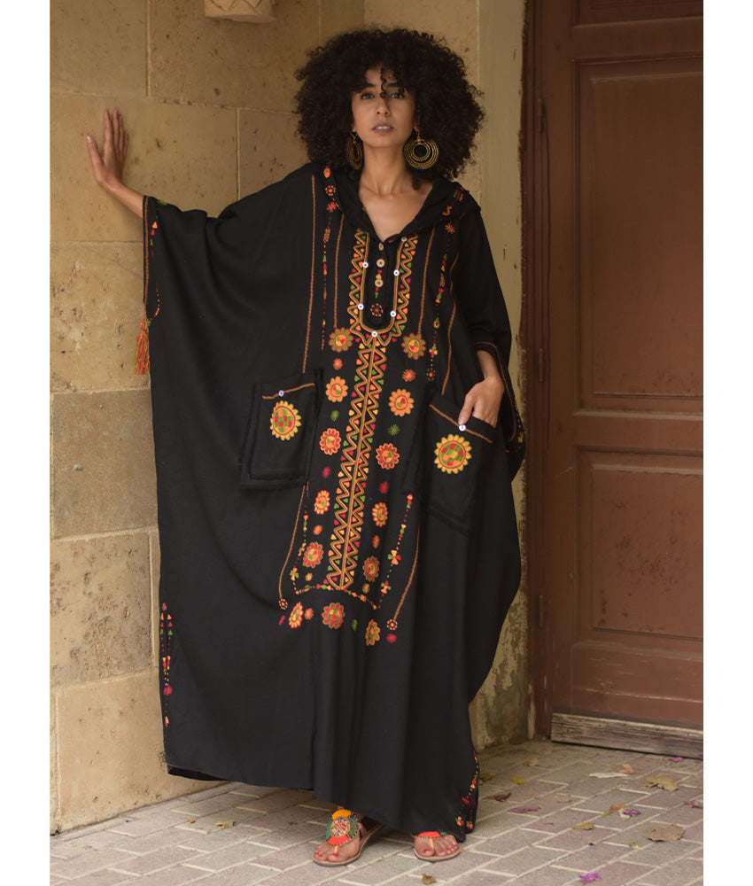 Black Siwa Embroidered Linen Kaftan with Hoodie handmade in Egypt & available at Jozee Boutique.