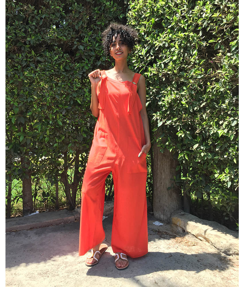 Orange Linen Jumpsuit handmade in Egypt & available at Jozee Boutique.