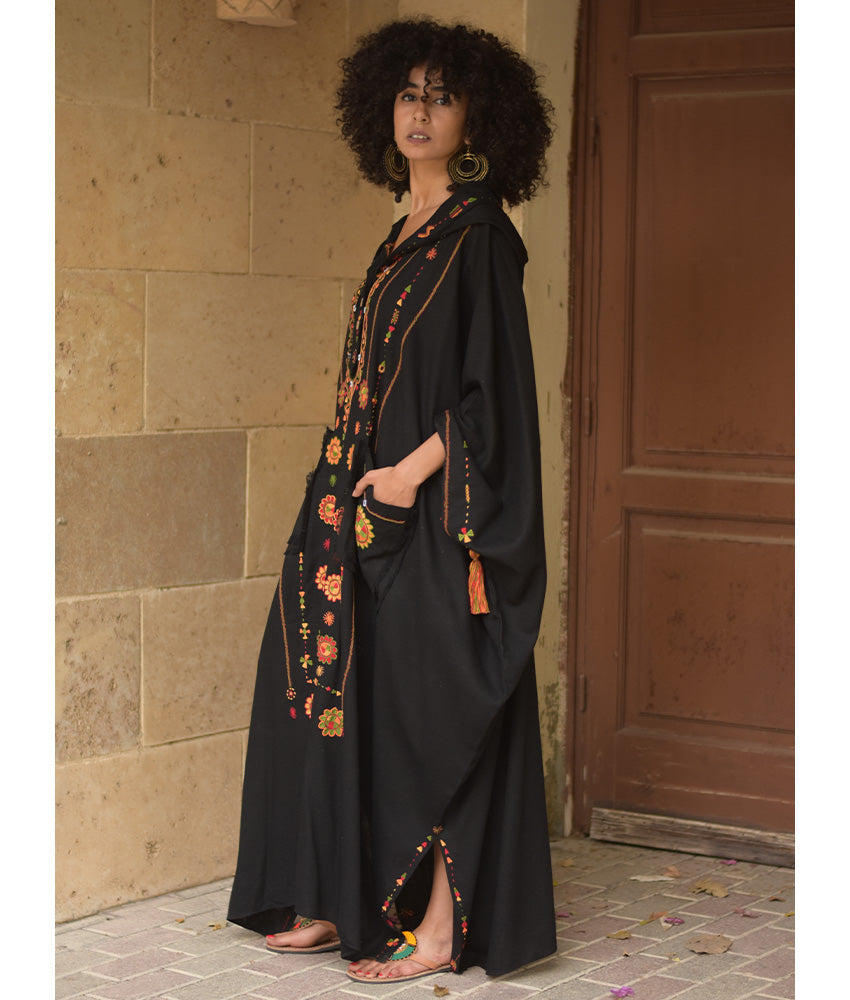 Black Siwa Embroidered Linen Kaftan with Hoodie handmade in Egypt & available at Jozee Boutique.