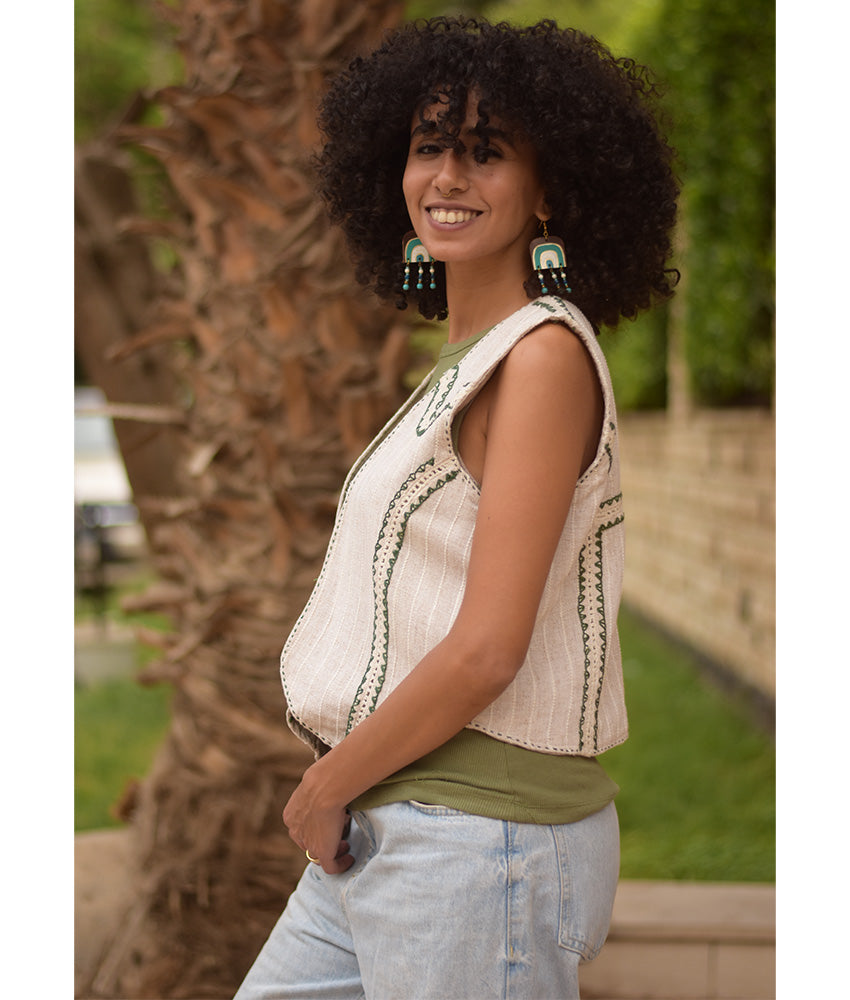 Off White & Olive Green Hand Embroideries Linen Vest handmade in Egypt & available at Jozee Boutique.