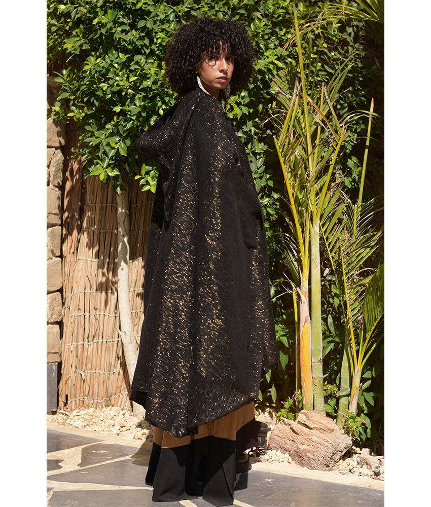 Black & Gold Handwoven Heavy Cotton Midi Cape handmade in Egypt & available at Jozee Boutique.handmade in Egypt & available at Jozee Boutique.