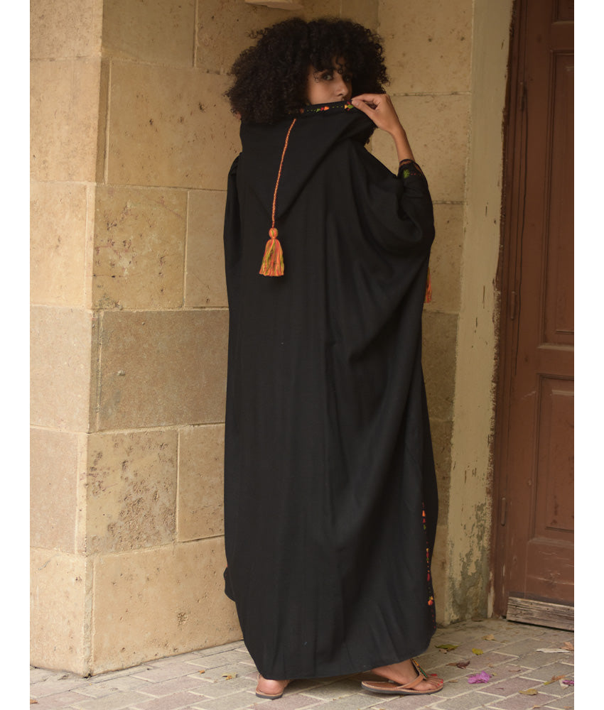 Black Siwa Embroidered Linen Kaftan with Hoodie handmade in Egypt & available at Jozee Boutique.