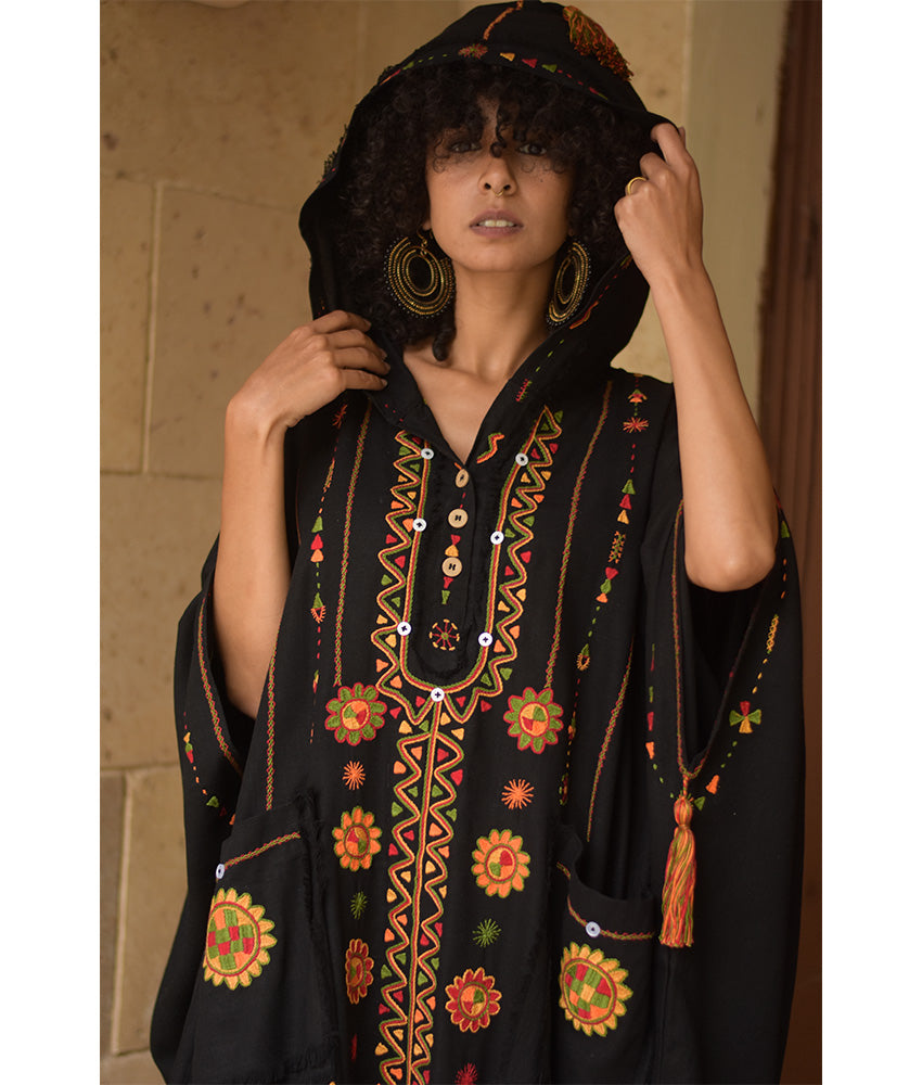 Black Siwa Embroidered Linen Kaftan with Hoodie handmade in Egypt & available at Jozee Boutique.