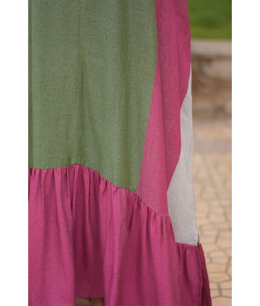 Green & Fuchsia Pink Handwoven Ruffle Dress handmade in Egypt & available at Jozee Boutique.
