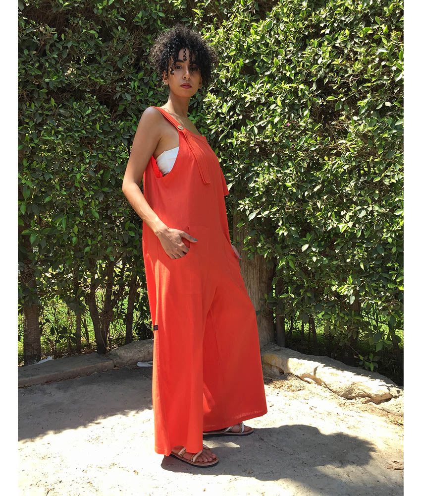 Orange Linen Jumpsuit handmade in Egypt & available at Jozee Boutique.