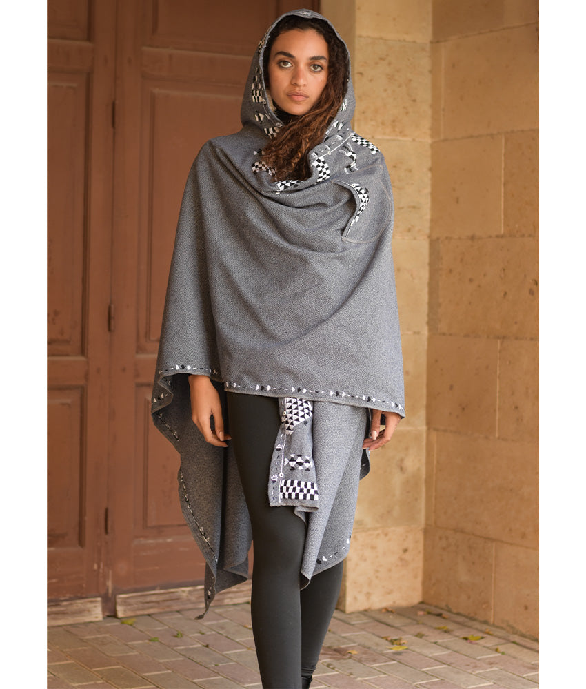 Grey Siwa Embroidered Wool Midi Cape handmade in Egypt & available at Jozee Boutique.