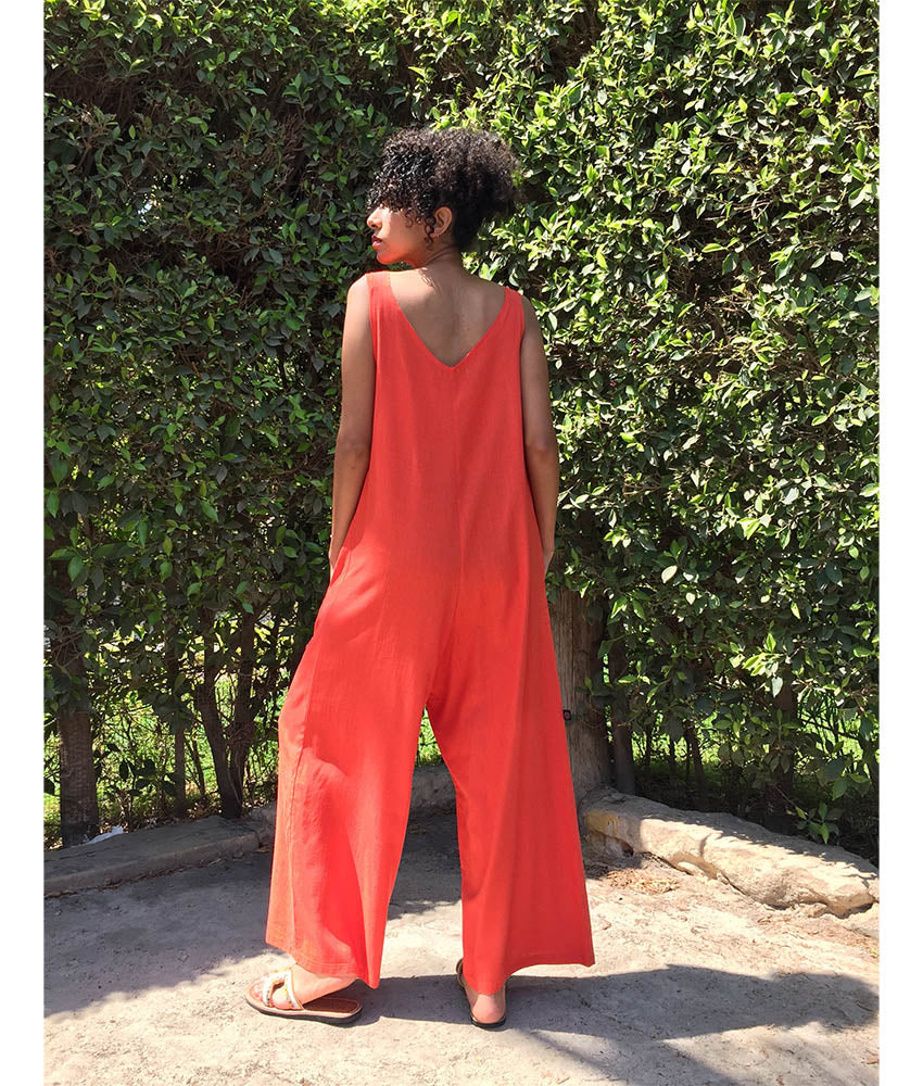 Orange Linen Jumpsuit handmade in Egypt & available at Jozee Boutique.