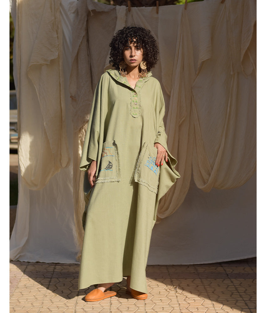 Light Olive Hand Embroidered Linen Kaftan with Hoodie handmade in Egypt & available at Jozee Boutique.