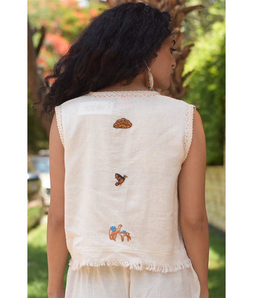 Off-White Linen Set with Hand Embroideries handmade in Egypt & available at Jozee Boutique.