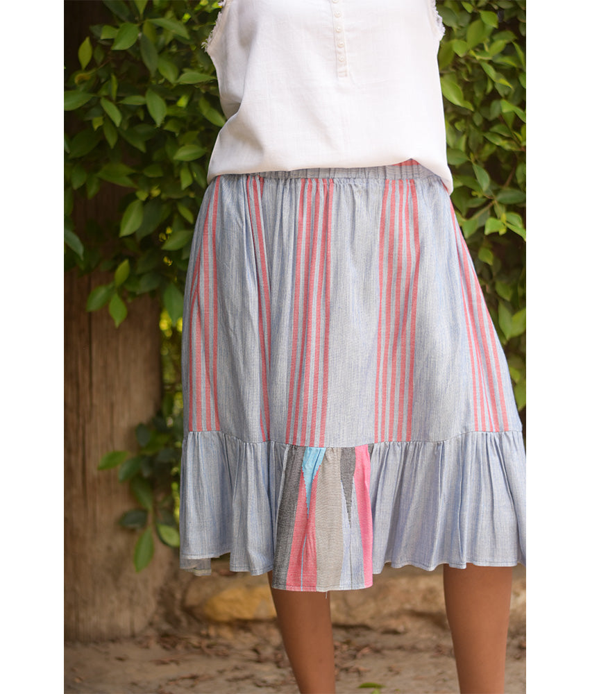 Light Grey & Pink Handwoven Short Ruffle Skirt handmade in Egypt & available at Jozee Boutique.
