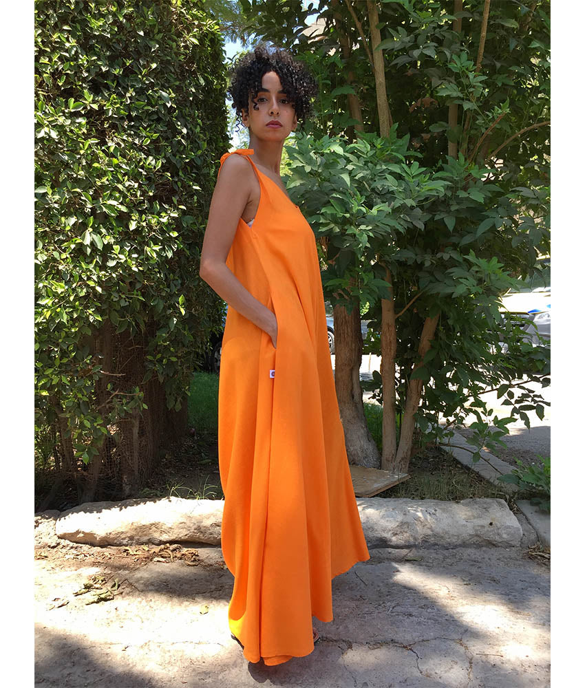 Orange Flowy Jumpsuit/Dress handmade in Egypt & available at Jozee Boutique.
