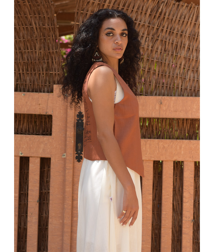 Cinnamon El Mahrousa Linen Wrap Vest handmade in Egypt & available at Jozee Boutique.