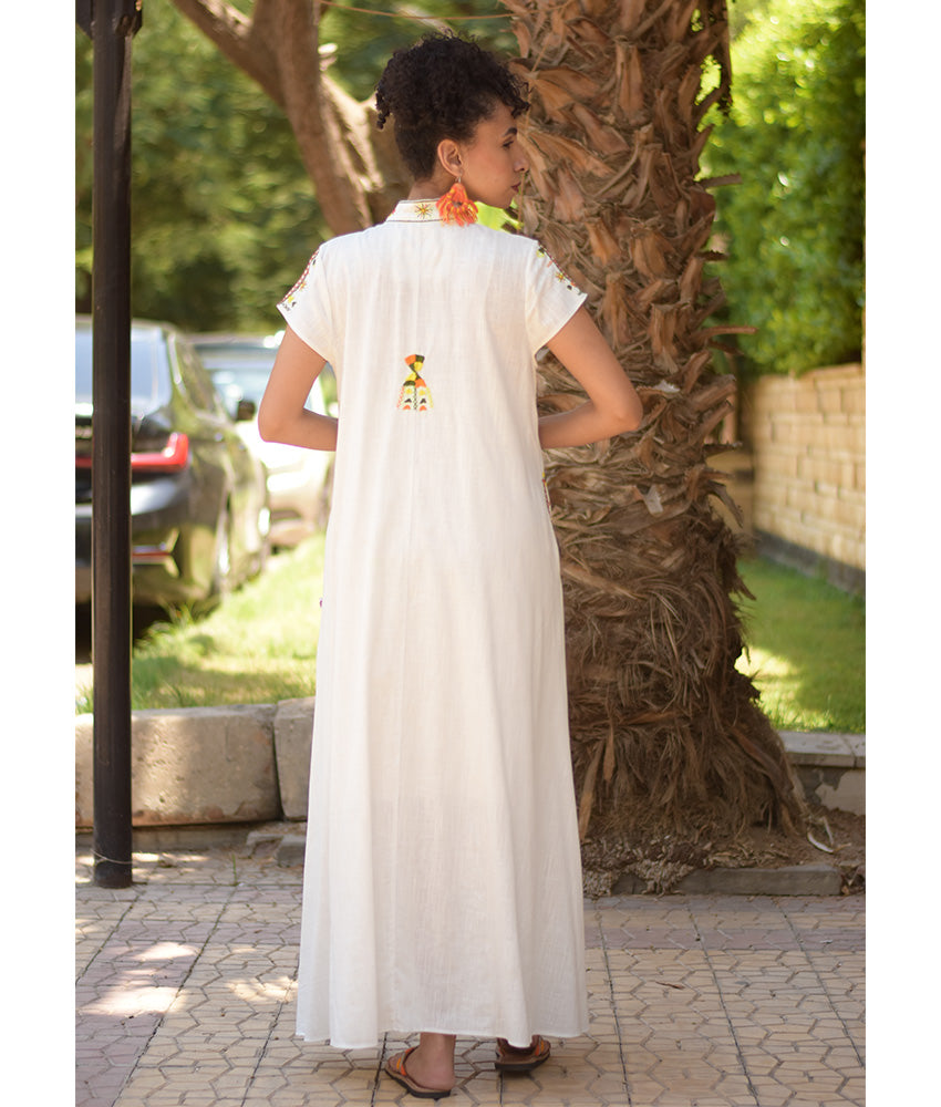 White Siwa Embroidered Linen Japanese Dress handmade in Egypt & available at Jozee Boutique.