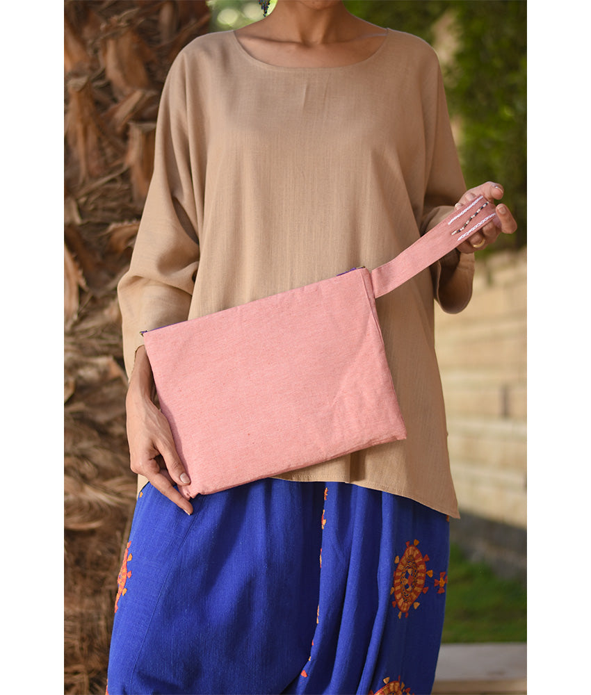 Saumon Embroidered Clutch handmade in Egypt & available at Jozee Boutique.