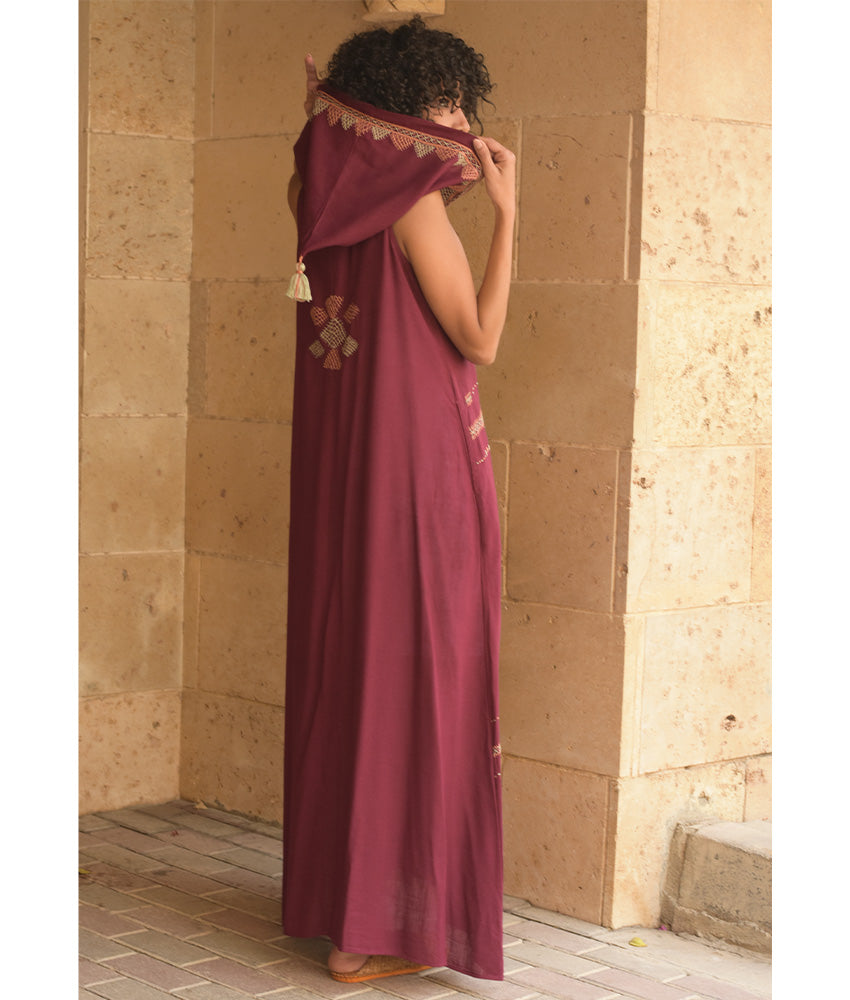 Burgundy Siwa Heavily Embroidered Linen Dress with Hoodie handmade in Egypt & available at Jozee Boutique.