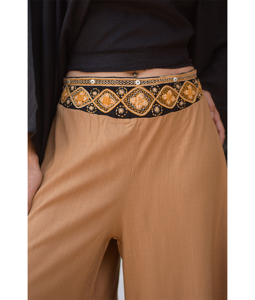 Camel Siwa Embroidered Flowy Pants handmade in Egypt & available at Jozee Boutique.