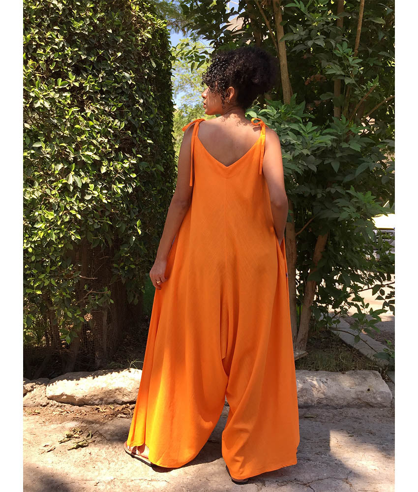 Orange Flowy Jumpsuit/Dress handmade in Egypt & available at Jozee Boutique.