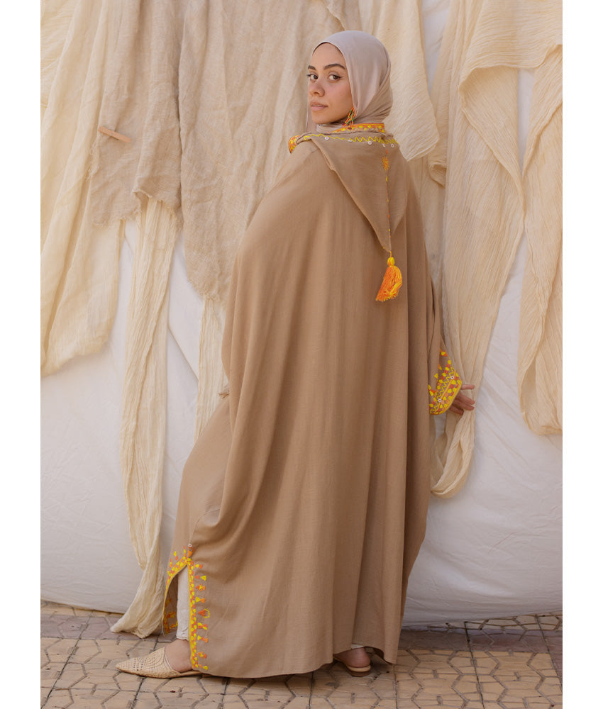 Dark Beige Siwa Embroidered Linen Kaftan with Hoodie handmade in Egypt & available at Jozee Boutique.