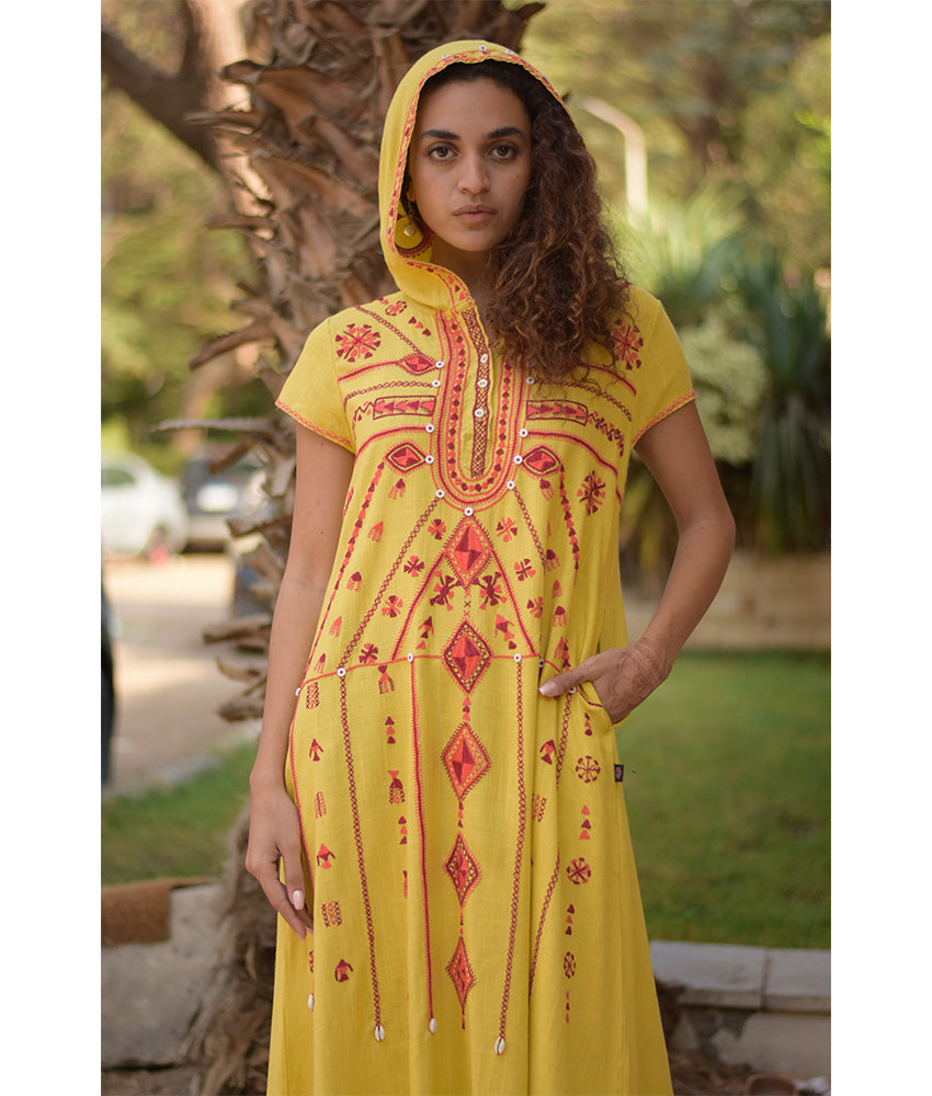 Mustard Siwa Heavily Embroidered Linen Dress with Hoodie handmade in Egypt & available at Jozee Boutique.