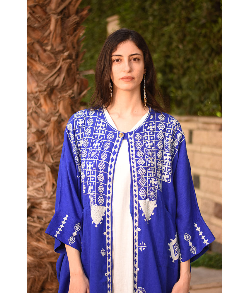 Electric Blue Siwa Embroidered Handwoven Linen Cardigan handmade in Egypt & available at Jozee Boutique.