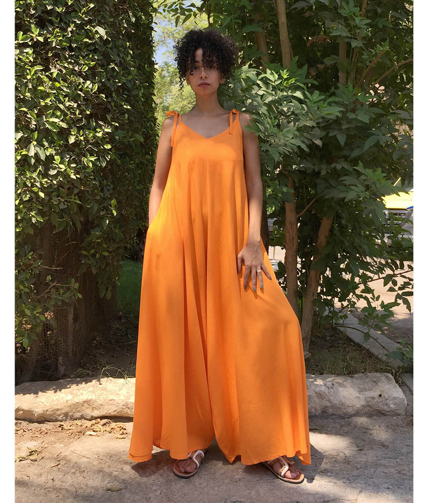 Orange Flowy Jumpsuit/Dress handmade in Egypt & available at Jozee Boutique.
