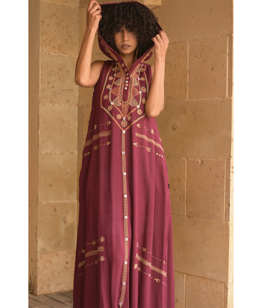 Burgundy Siwa Heavily Embroidered Linen Dress with Hoodie handmade in Egypt & available at Jozee Boutique.