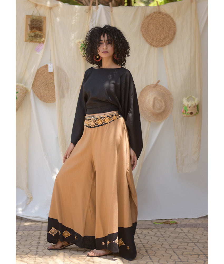 Camel Siwa Embroidered Flowy Pants handmade in Egypt & available at Jozee Boutique.