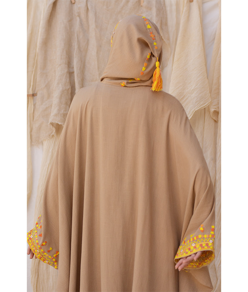 Dark Beige Siwa Embroidered Linen Kaftan with Hoodie handmade in Egypt & available at Jozee Boutique.