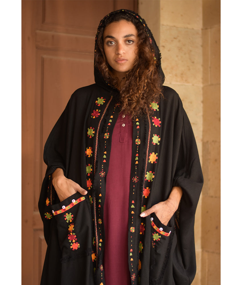 Black Siwa Embroidered Linen Cardigan/Abaya with Hoodie handmade in Egypt & available at Jozee Boutique.