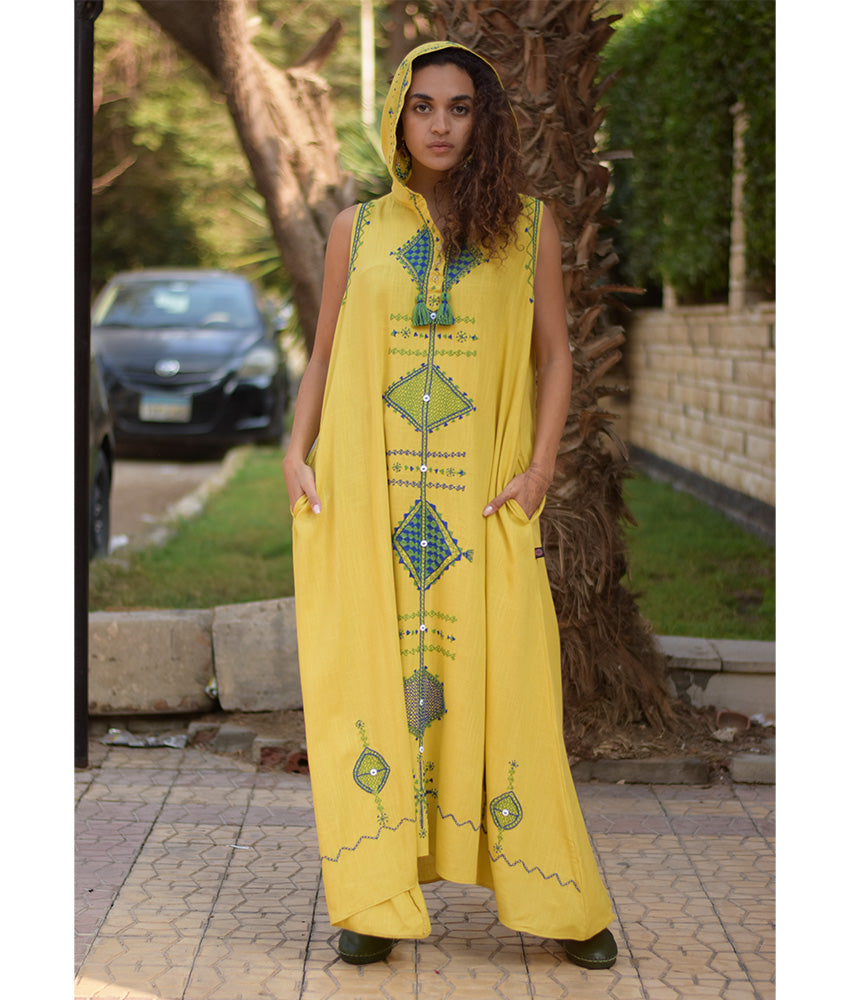 Mustard Siwa Heavily Embroidered Linen Dress with Hoodie handmade in Egypt & available at Jozee Boutique.