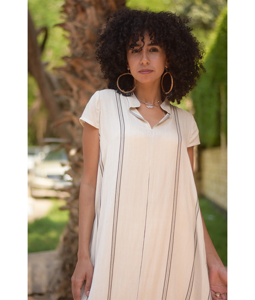 Off White Handwoven Ruffle Dress Handmade in Egypt & available at Jozee Boutique
