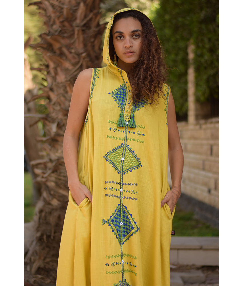 Mustard Siwa Heavily Embroidered Linen Dress with Hoodie handmade in Egypt & available at Jozee Boutique.