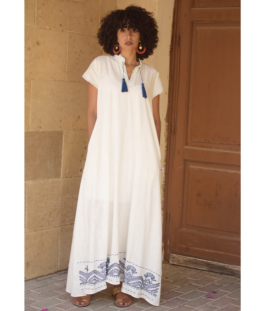 Off-White Linen Dress with Ancient Egyptian Lotus Embroidery handmade in Egypt & available at Jozee Boutique.