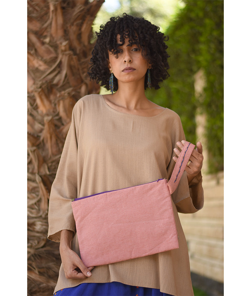 Saumon Embroidered Clutch handmade in Egypt & available at Jozee Boutique.